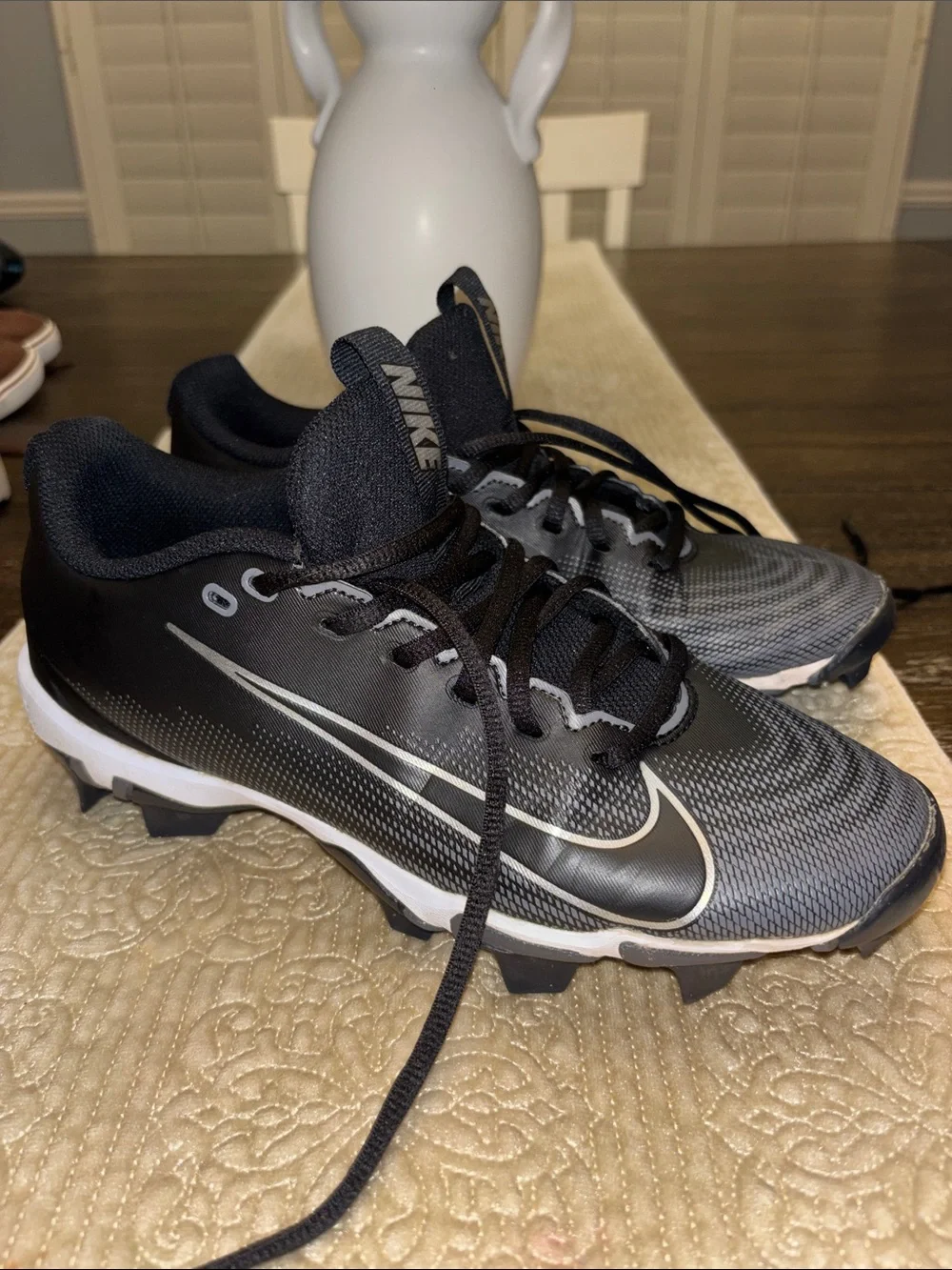 Youth Nike Black and Gray Football Cleats with Silver Swoosh